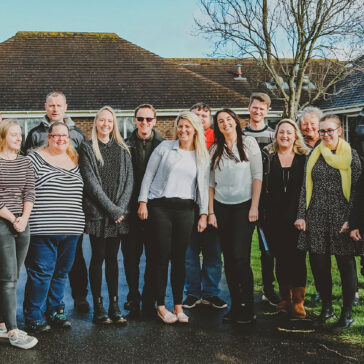 St David's House staff team in a group shot outside