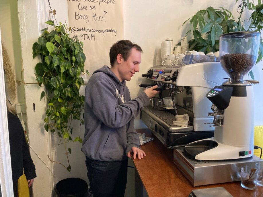 Craig using the coffee machine at Gaia