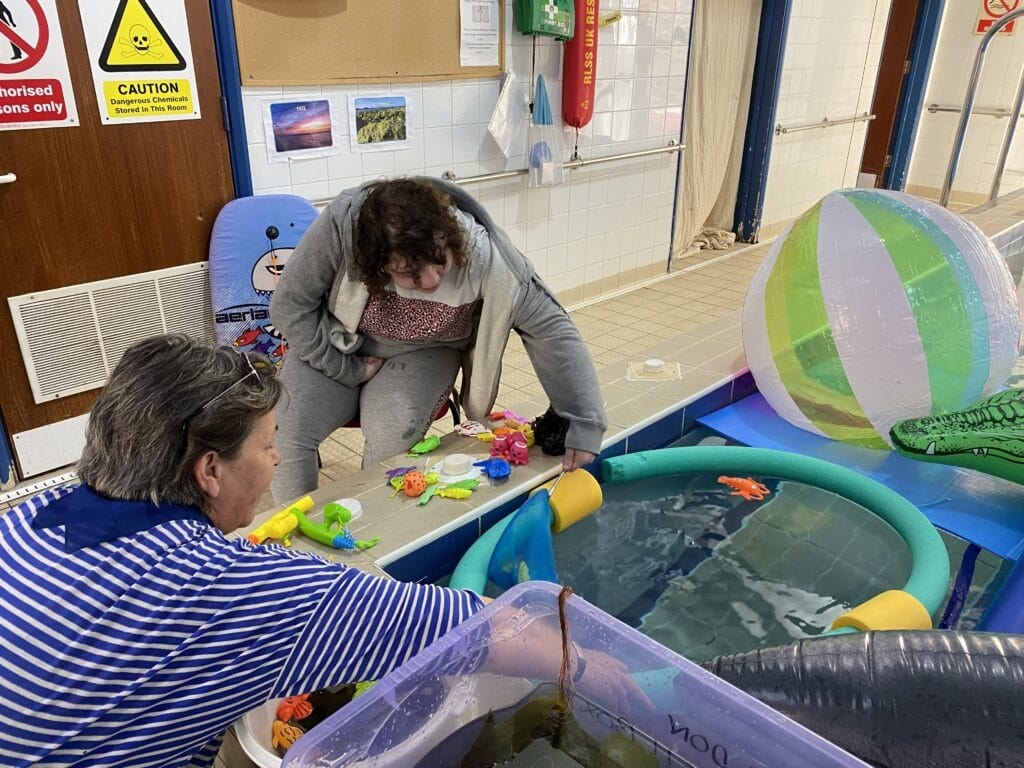 InFocus Student using virtual beach sensory pool
