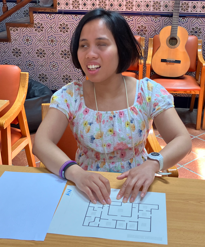 a student reading braille