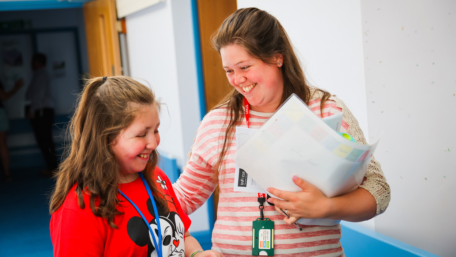 a therapist and a student. both are smiling